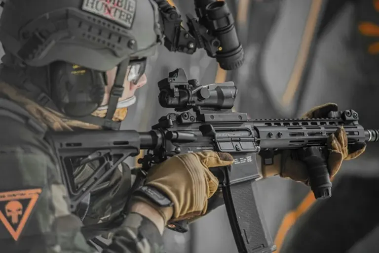 A technician-serviced Specna Arms AEG with high-end optics being used at a Gauteng airsoft field.